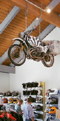 Andy Kilchmann's bike hangs from a beam