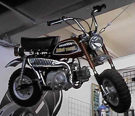 The classic Mini Trail 50 that hangs from the ceiling at University Honda 